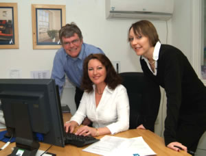 Watched by Roger Graffy, owner of Mylor Yacht Harbour, Cora Gollop and Angela Sims acquaint themselves with the new PacsoftMMS Marina Management System.